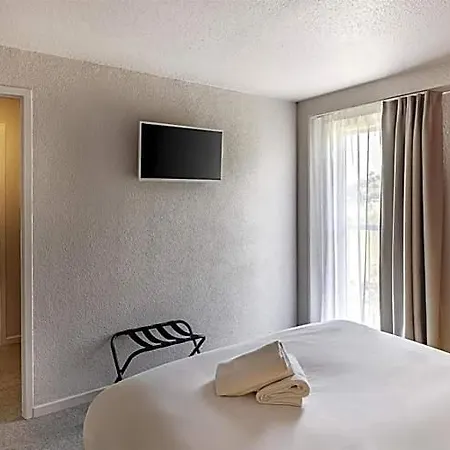Sure By Western Nimes Est